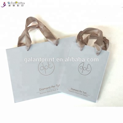 Custom logo printed luxury white paper shopping bag kraft food packaging brown clothing gift bag with handle